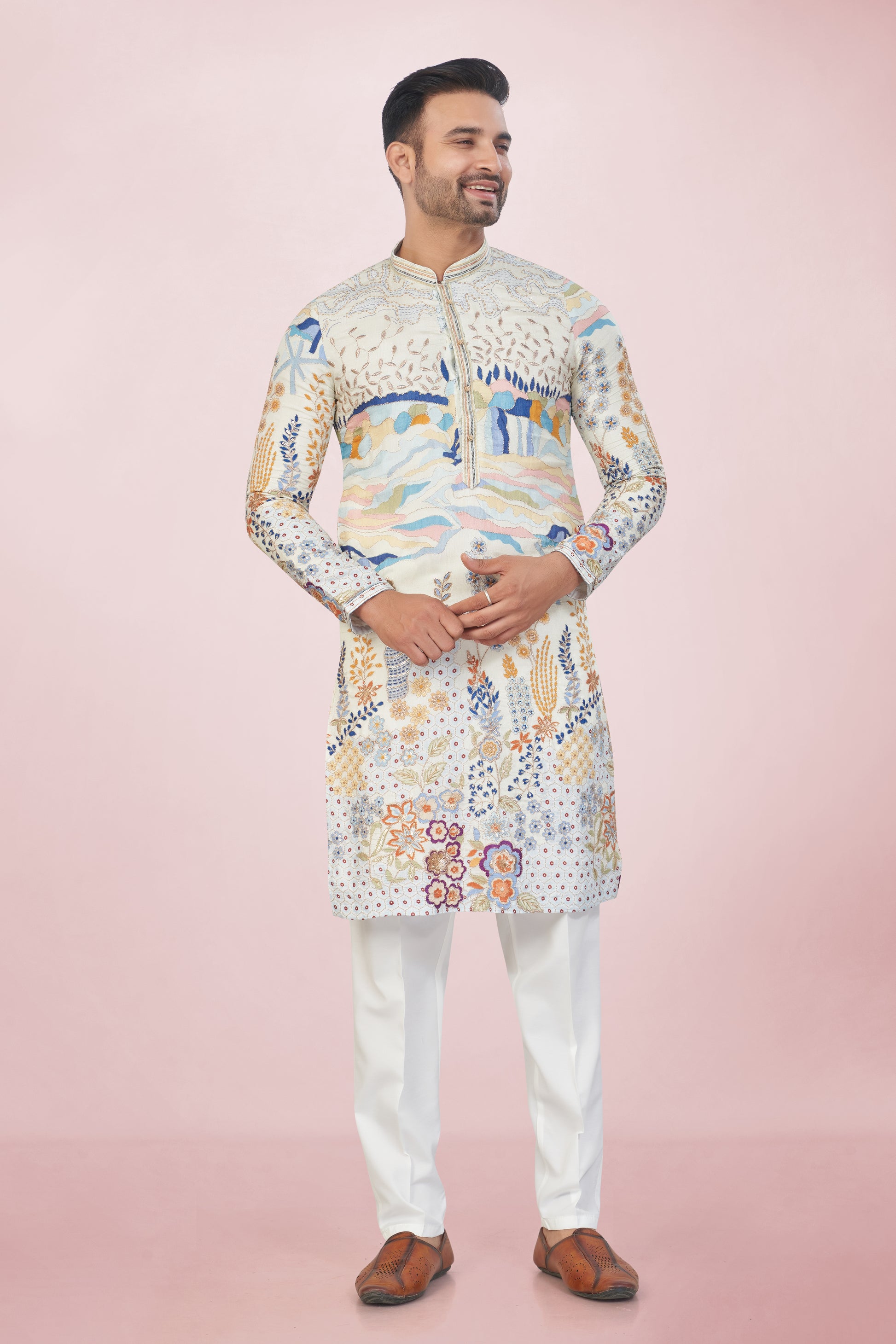 Stunning Ivory Embroidered Mirror Work Kurta Set